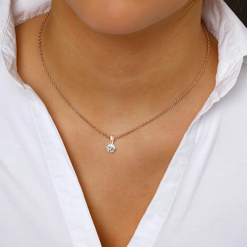 0.75 quilates colgante solitario en oro rojo con diamante redondo 