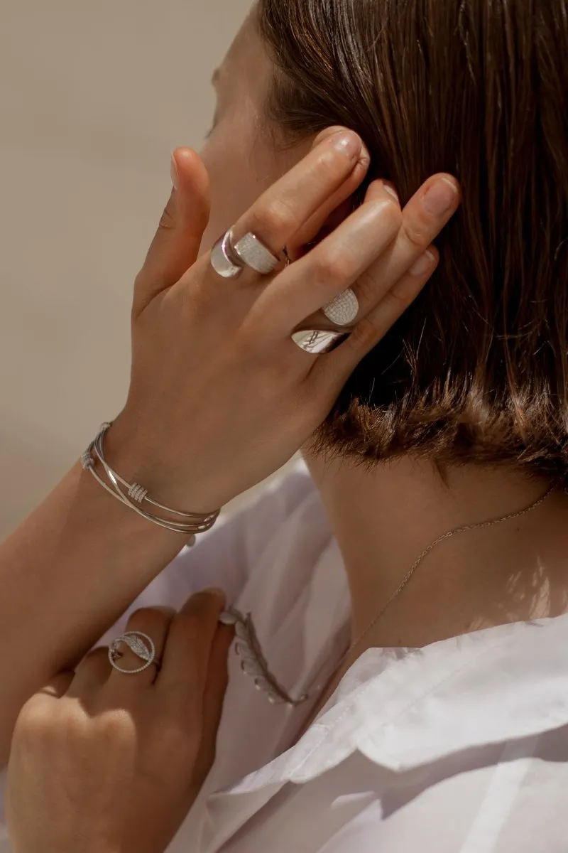 Anillos grandes diseo abierto irregular con circonitas