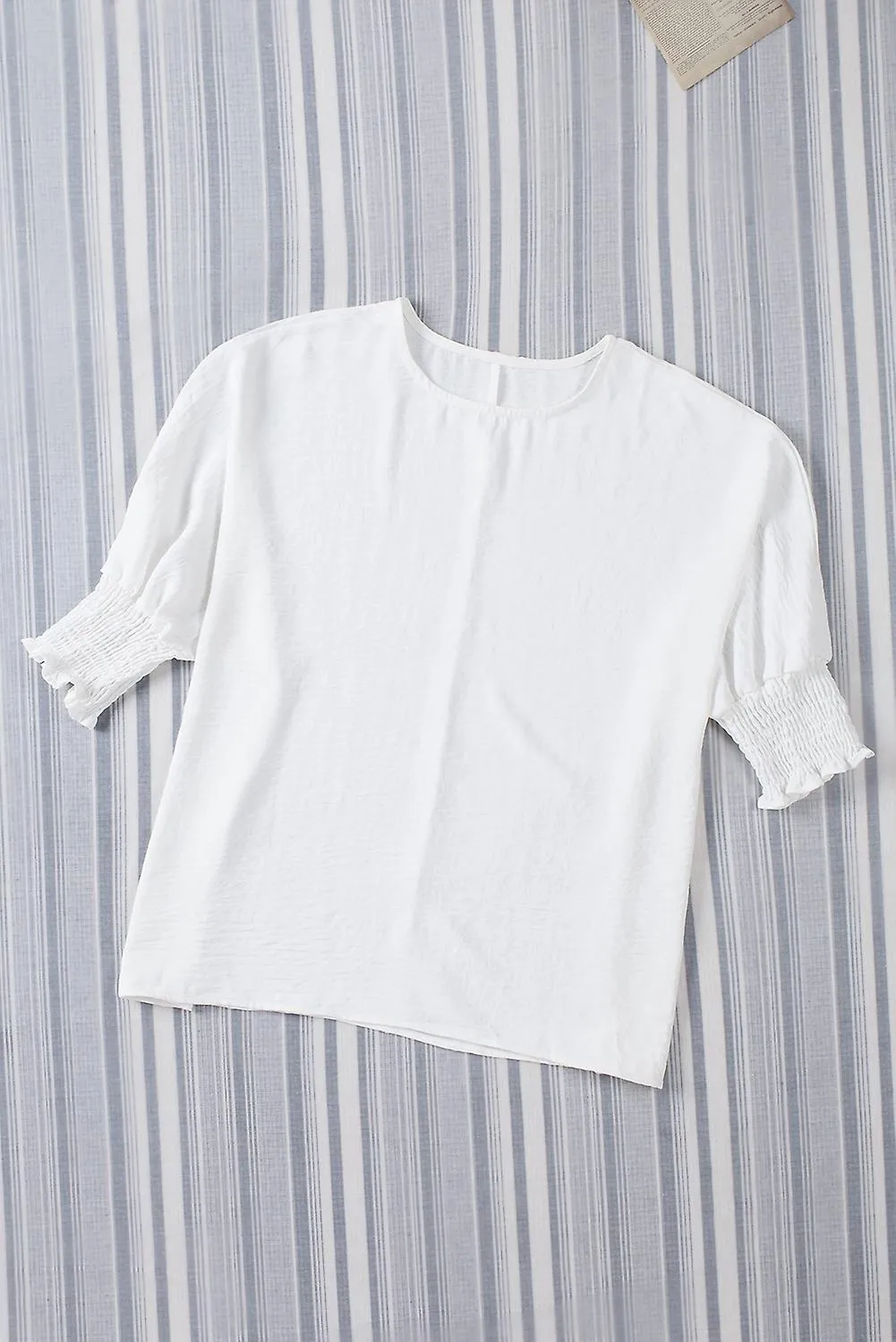 Camiseta de muñeca blanca para mujer