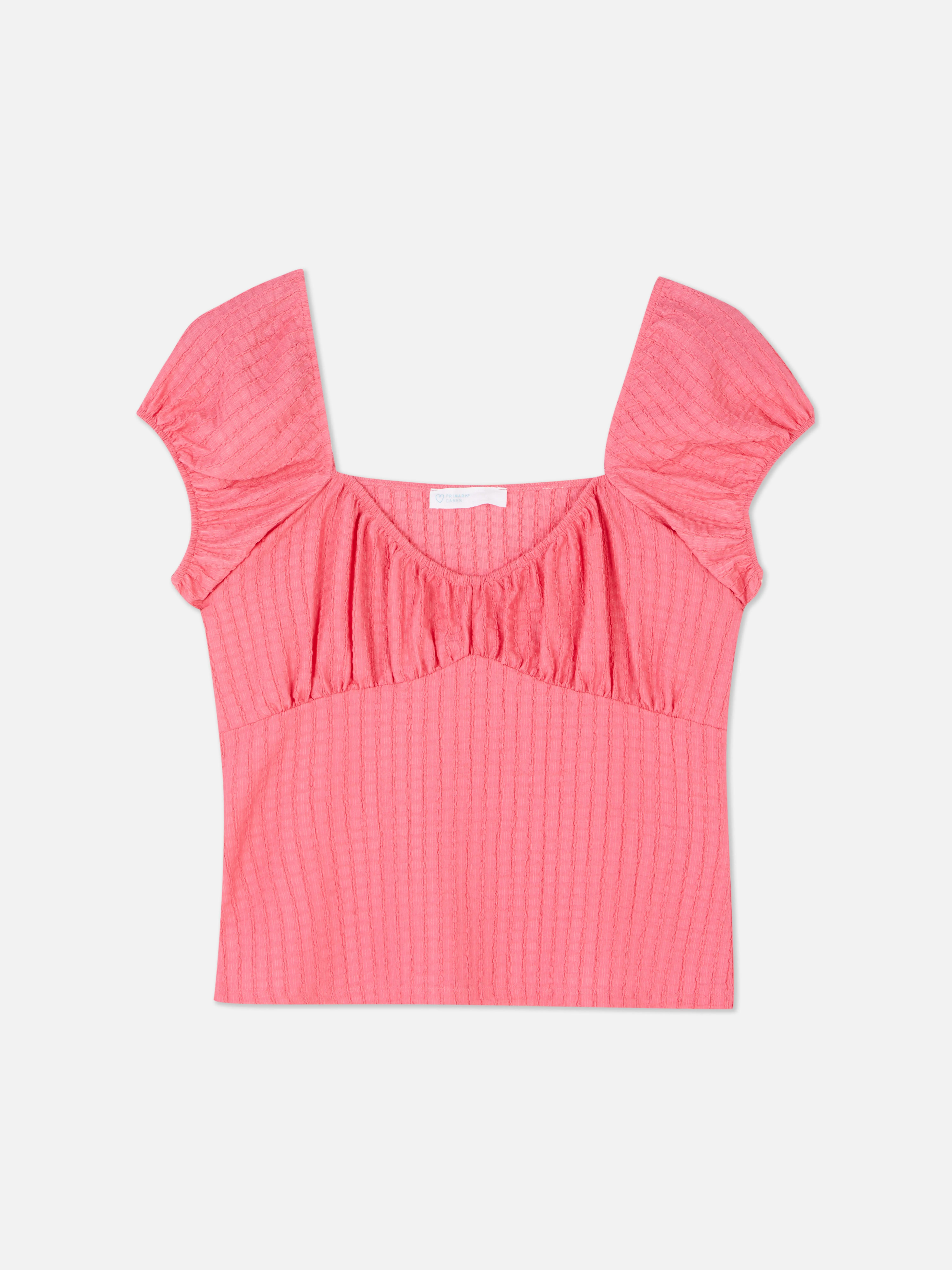 Camiseta escotada con mangas abullonadas