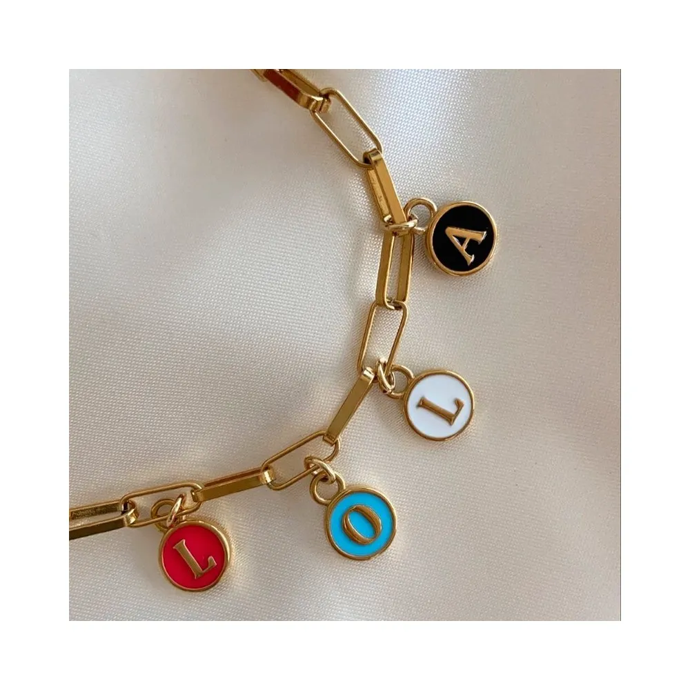Charm Letra Fucsia Oro