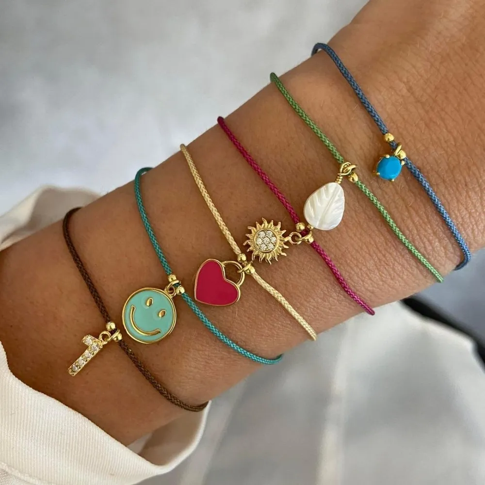 Charm Smiley Turquesa Oro