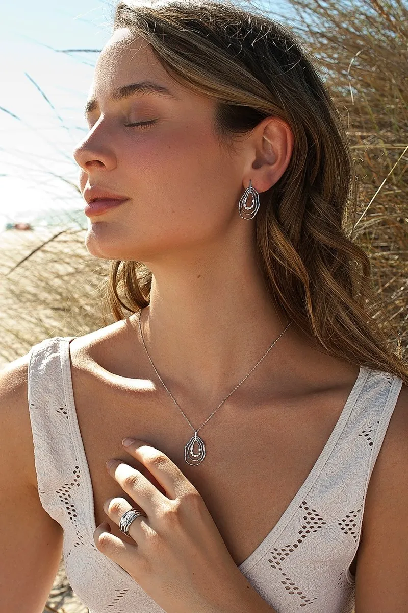 Collares con colgantes pieza ovalada y destellos de circonita