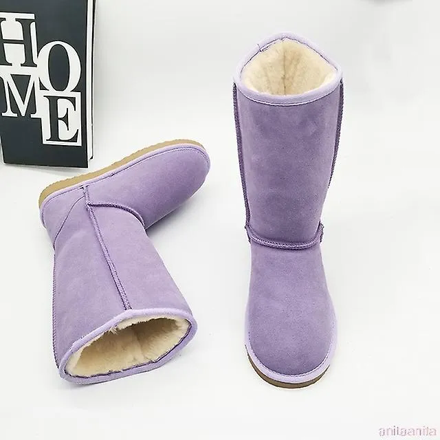 Mujeres australianas Unisex Botas de nieve altas Impermeable Cuero de invierno Botas largas Marca Invierno cálido Zapatos al air