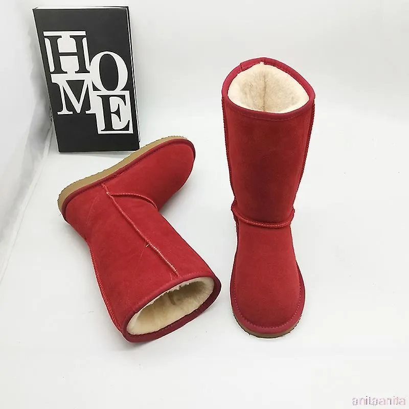Mujeres australianas Unisex Botas de nieve altas Impermeable Cuero de invierno Botas largas Marca Invierno cálido Zapatos al air