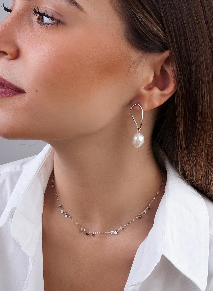 Pendientes largos perlas diseo irregular ovalado