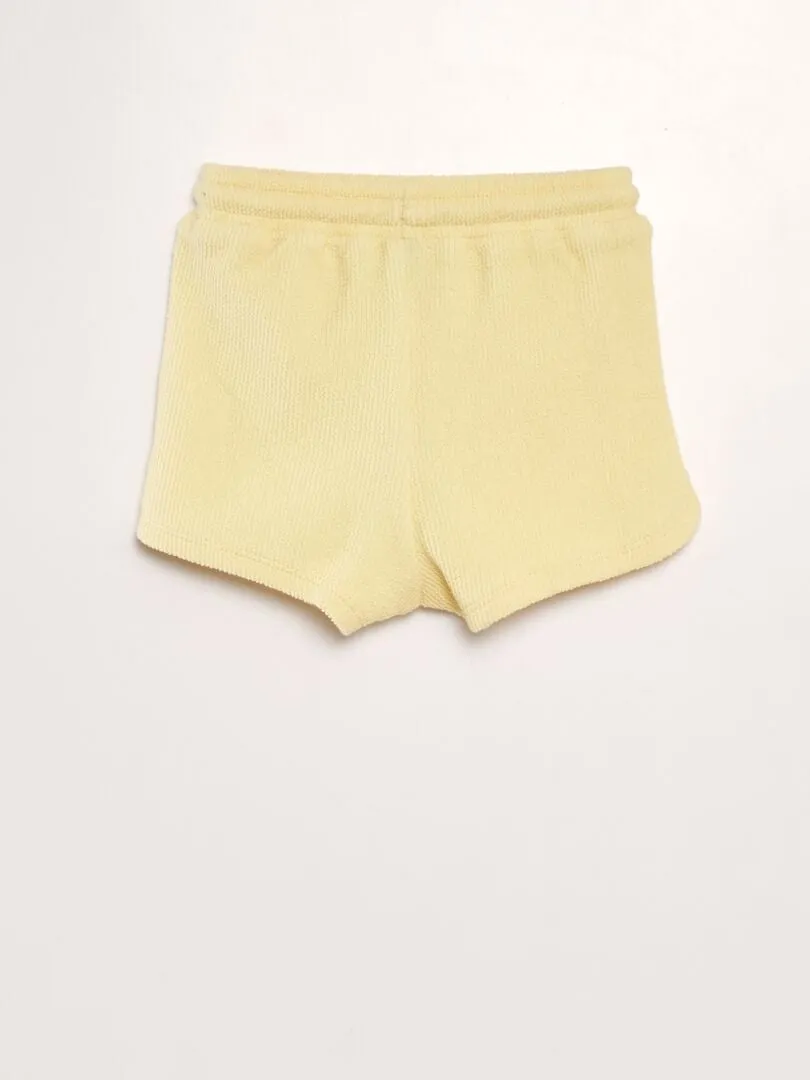 SHORT LISO ESTILO TEJIDO DE RIZO  AMARILLO