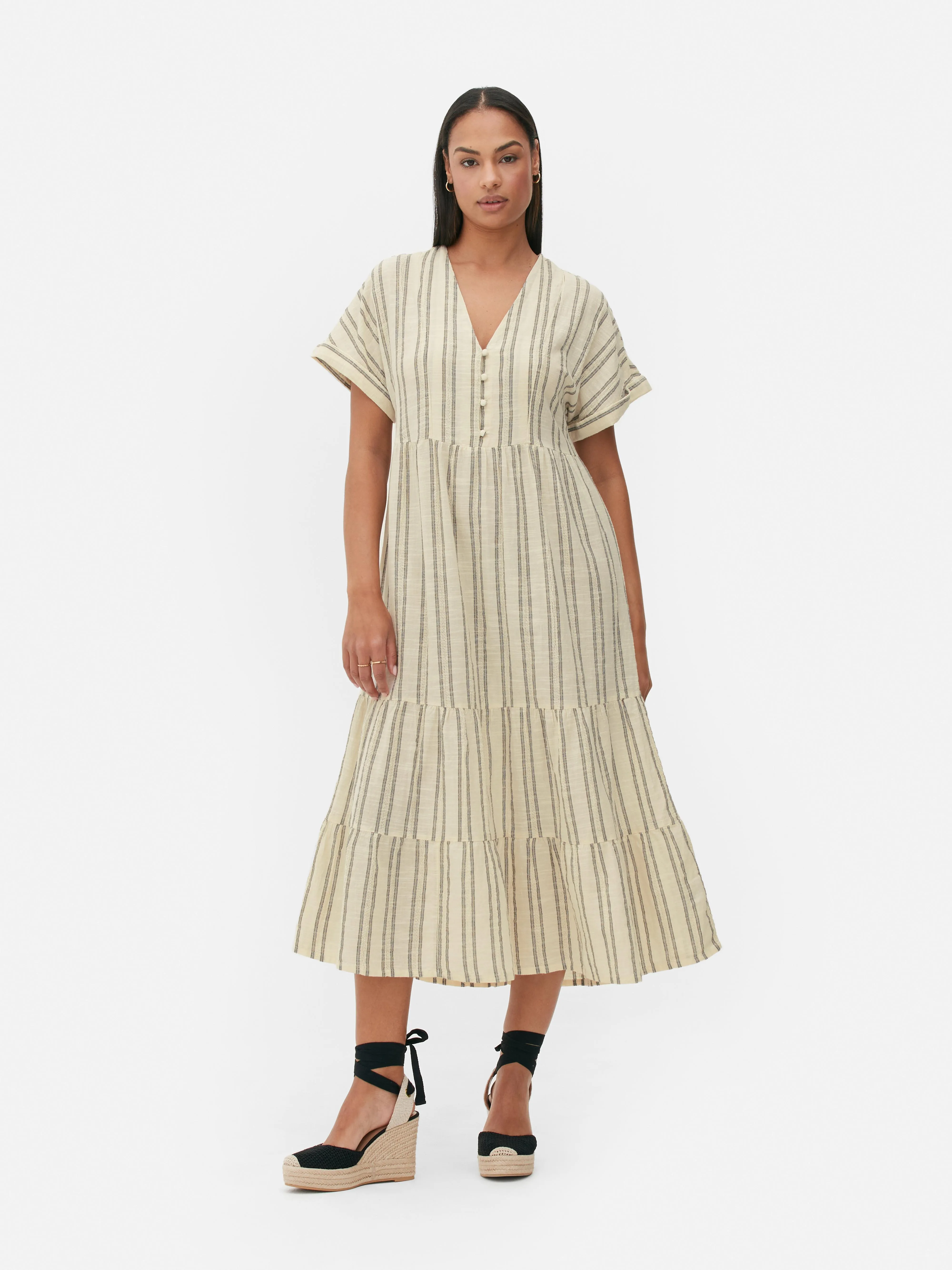 Vestido midi a rayas con vuelo