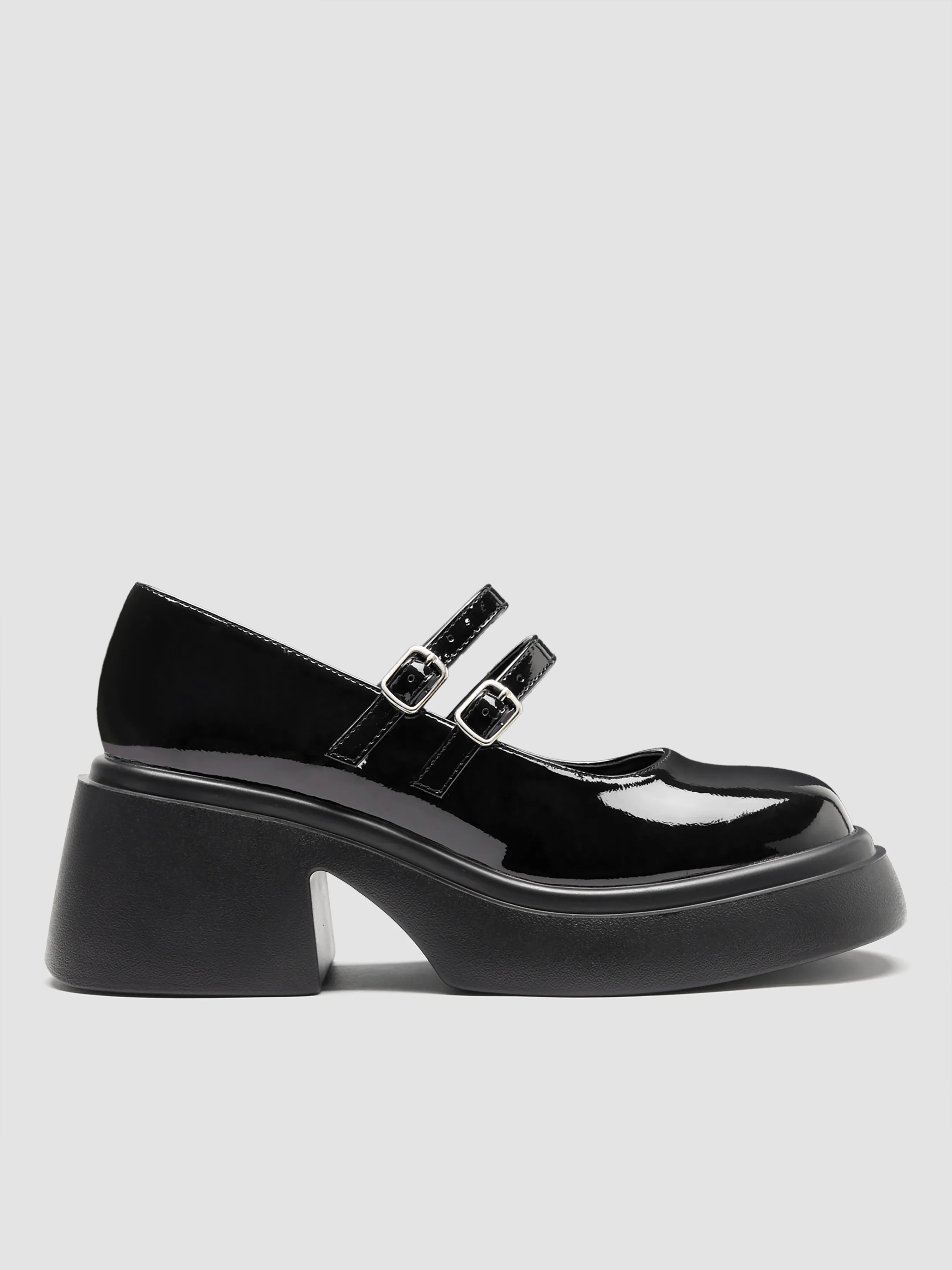  Zapatos tipo merceditas con doble correa y tacón grueso brillante
